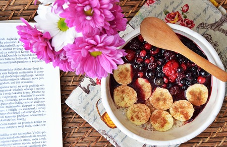 Oatmeal with tahini paste and berry topping